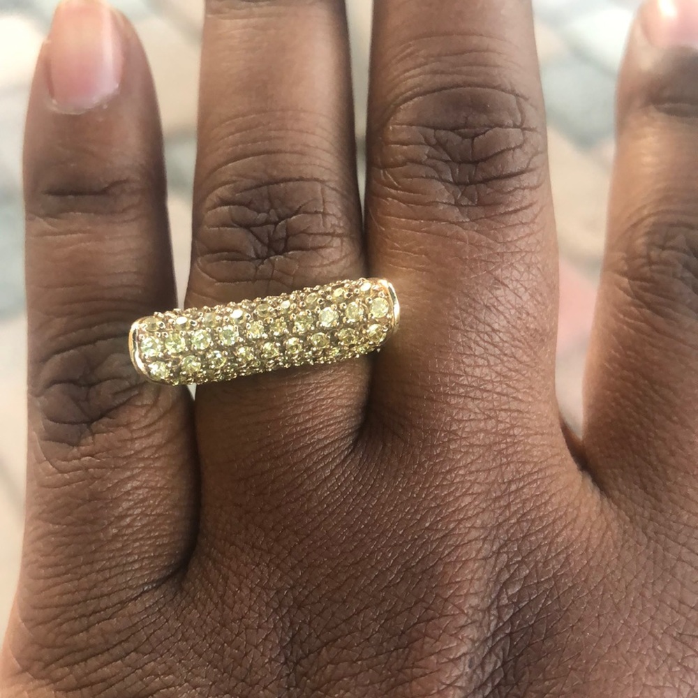 Cubic zirconia gold tone ring.